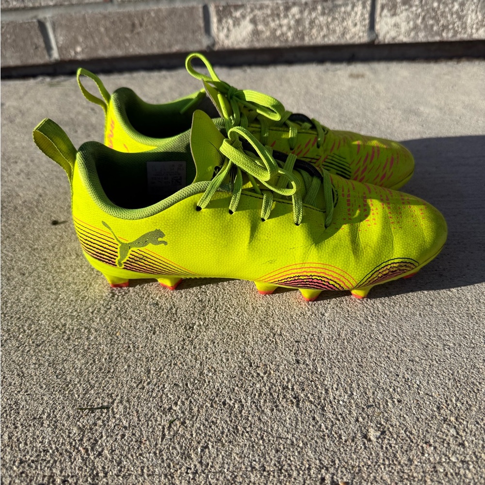 Puma Kids Neon Yellow Soccer Cleats with Orange Accents